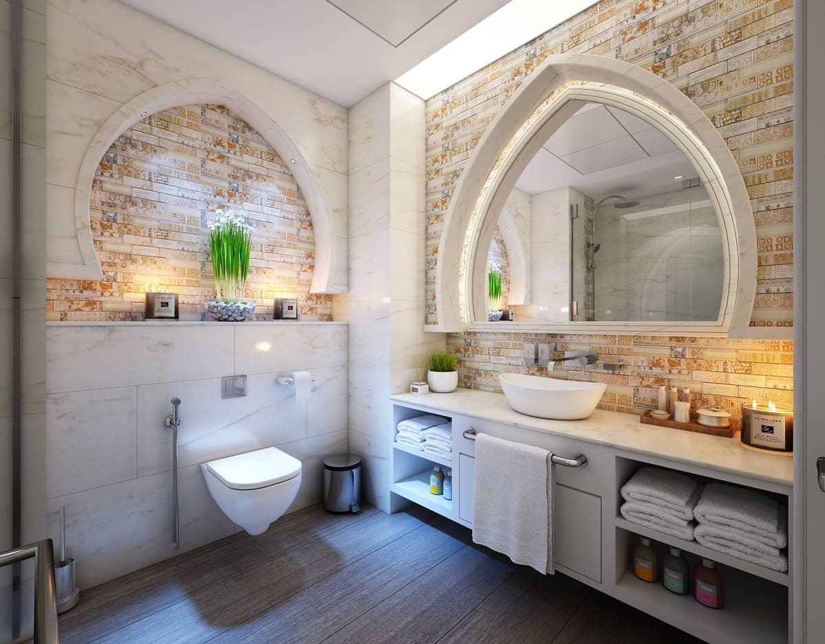 small bathroom withdecorative arches, hotel style bathroom